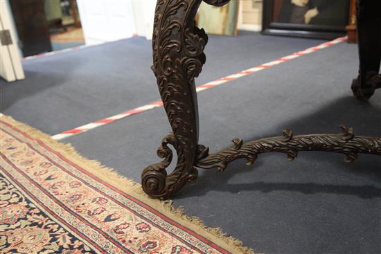 A 19th century Burmese hardwood centre or library table, W.5ft 10in. D.3ft 8in. H.2ft 6in.